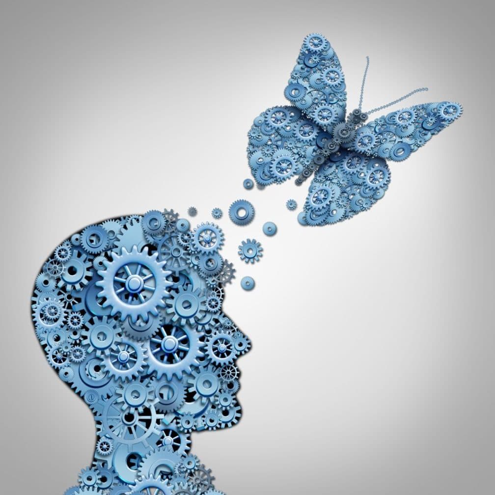 Human thinking and artificial intelligence concept as a technology symbol for a robot head and butterfly shaped with gears and machine cog wheels.